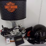 Harley-Davidson lamp, helmet, wallet and sunglasses.