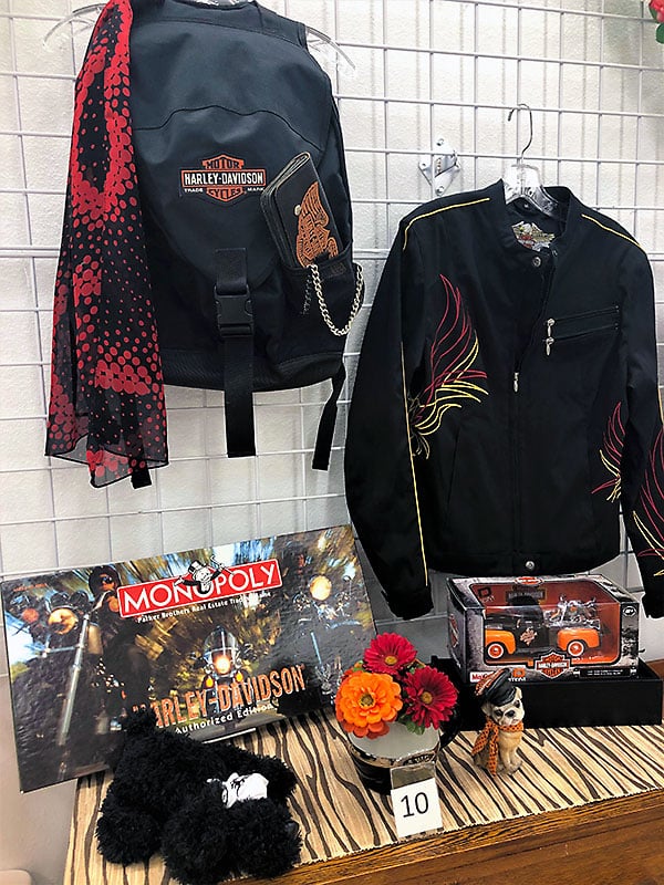 Harley Davidson jackets, Monopoly game and other collectibles.