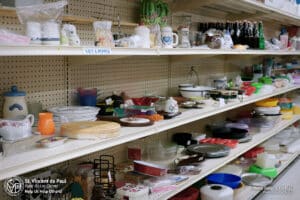 Housewares & Vintage Sale at SVDP Fond du Lac: used salt and pepper shakers, plates and bowls for sale.