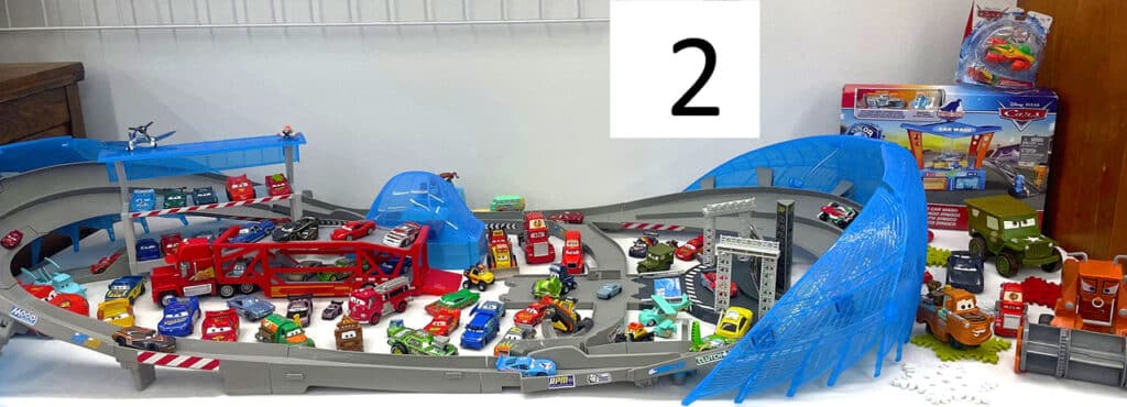 Disney Cars toys diecast cars and racetrack.