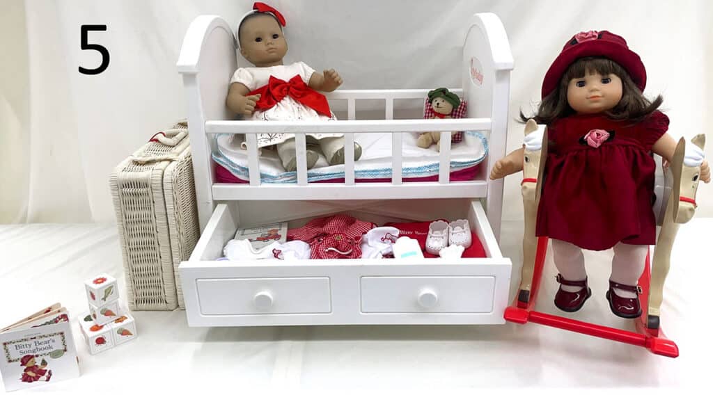 American Girl Bitty Baby dolls, crib and dresser playset.