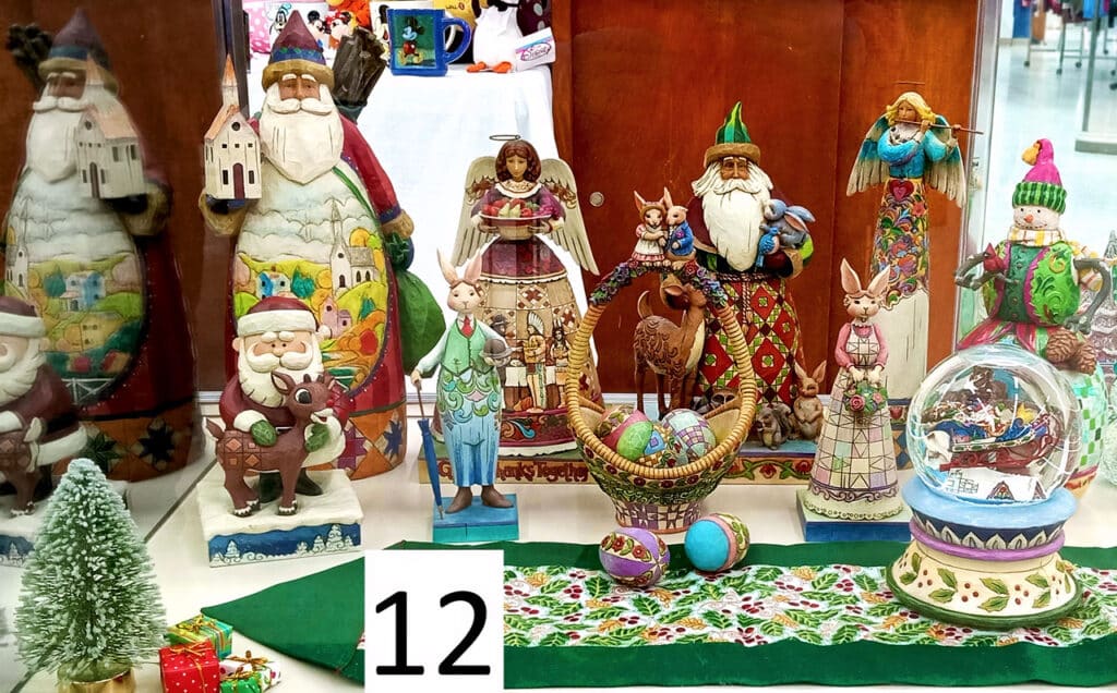Jim Shore Christmas figures and snow globe including Santa and Rudolph.